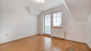 Prodej podkrovního bytu 4+kk a dvě garážová stání v Olomouci